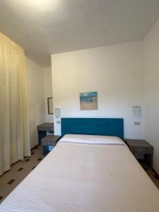 Katil atau katil-katil dalam bilik di Albergo Godenizzo
