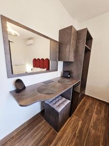 Kuchyň nebo kuchyňský kout v ubytování Sunrise Rooms