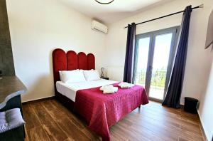 Postel nebo postele na pokoji v ubytování Sunrise Rooms