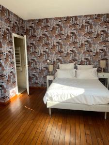 Postel nebo postele na pokoji v ubytování Le Clos du Lupin + 22 fotografií