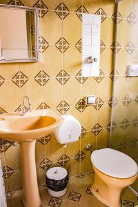 Ванная комната в Hotel Primavera Betim