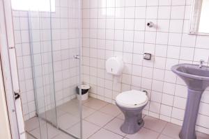 Ванная комната в Hotel Primavera Betim