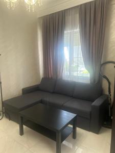 Posezení v ubytování Vasilev Apartment, Nea Kallikratia