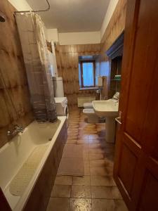 Koupelna v ubytování Casa vacanza predaia