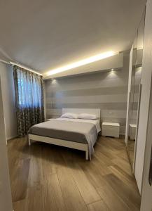 Postel nebo postele na pokoji v ubytování Villa Paternelli