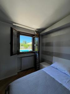 Postel nebo postele na pokoji v ubytování Villa Paternelli + 12 fotografií