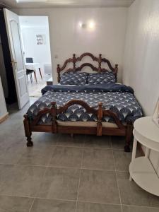 Katil atau katil-katil dalam bilik di Appartement en résidence