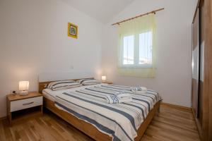 Posteľ alebo postele v izbe v ubytovaní Apartments & Room Španjol