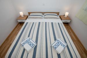 Posteľ alebo postele v izbe v ubytovaní Apartments & Room Španjol
