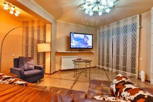 TV a/nebo společenská místnost v ubytování A&S Penthouse with pool and sea view