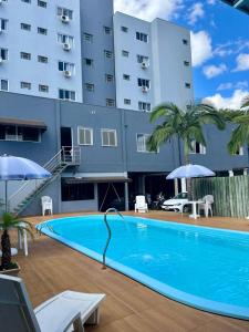 Bazén v ubytování Moura Palace Hotel nebo v jeho okolí