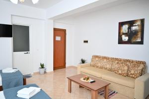 a living room with a couch and a table at Bella Vista in Borsh