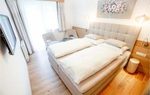 Łóżko lub łóżka w pokoju w obiekcie Hochwertige Ferienwohnung