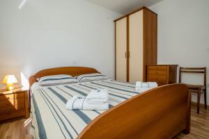 Posteľ alebo postele v izbe v ubytovaní Apartments & Room Španjol