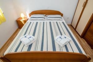 Posteľ alebo postele v izbe v ubytovaní Apartments & Room Španjol