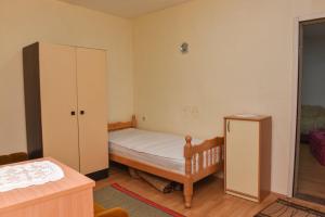 Postel nebo postele na pokoji v ubytování Kuca u Prokuplju
