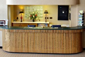 a lobby with a reception counter in a hospital at GOLD VAULT INN in Radcliff
