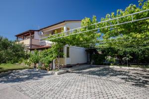Vonkajšia záhrada v ubytovaní Apartments & Room Španjol