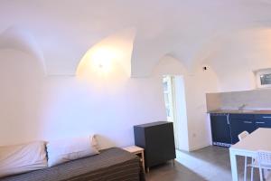 Postel nebo postele na pokoji v ubytování Casa dell'Arco