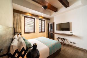 TV a/nebo společenská místnost v ubytování Sophia Hotel