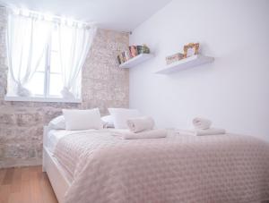 Postel nebo postele na pokoji v ubytování Dolce Vita