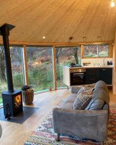 A seating area at Luxury romantic Roundhouse and hot tub for two