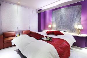 Postel nebo postele na pokoji v ubytování Hotel L'eclair (Adult Only) + 22 fotografií