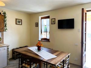 TV a/nebo společenská místnost v ubytování Casina di Desiree e Aurora