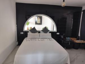 Posteľ alebo postele v izbe v ubytovaní Pinar Suites Habitaciones