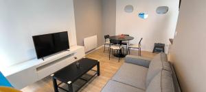 TV a/nebo společenská místnost v ubytování Lyla Home + 1 fotografie