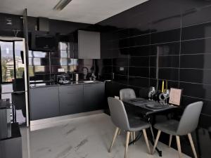Kuchyňa alebo kuchynka v ubytovaní Pinar Suites Habitaciones