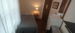 Postel nebo postele na pokoji v ubytování Cappuccio Hotel