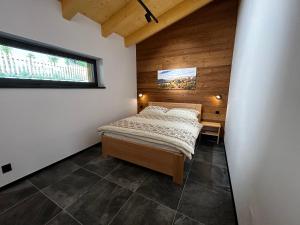 Postel nebo postele na pokoji v ubytování Horska Rezort