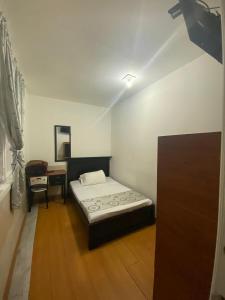 Postel nebo postele na pokoji v ubytování Hostal Casa Primavera