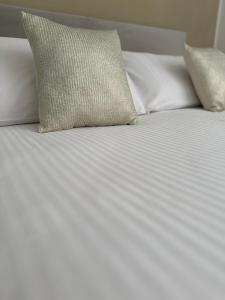 Postel nebo postele na pokoji v ubytování Petra Maris B&B