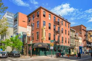 a brick building on a city street with at Society Hill Hotel in Philadelphia +4 photos