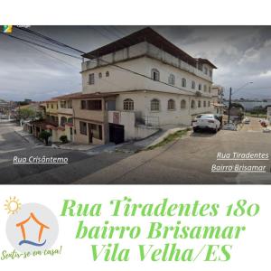a picture of a building on a street at Ape privativo no Brisamar - 10min Praia de Itaparica - Sentir-se em Casa! in Vila Velha