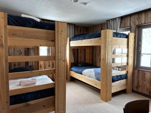 a bunk bed room with two bunk beds at Legend Inn Myoko in Myoko