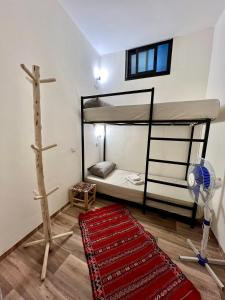 Krevet ili kreveti na sprat u jedinici u okviru objekta Dar Oussama