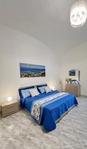 En eller flere senge i et værelse på Villino Annamaria