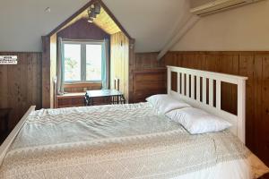 Postel nebo postele na pokoji v ubytování Sunset Sound Escape