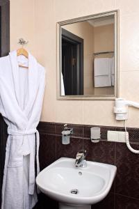 Koupelna v ubytování Time Hotel
