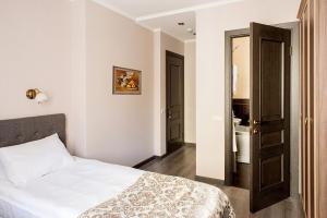 Postel nebo postele na pokoji v ubytování Time Hotel