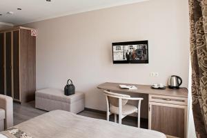 TV a/nebo společenská místnost v ubytování Time Hotel