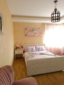 Postel nebo postele na pokoji v ubytování Apartman Golden Rose