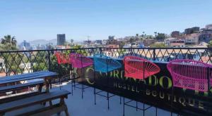 a group of chairs sitting on top of a building at Cabaña DW in Tijuana