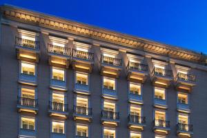 a tall building with balconies on the side of it at King George, a Luxury Collection Hotel, Athens in Athens