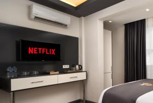 Postel nebo postele na pokoji v ubytování Bakırköy Zeugma Suit Otel