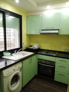 Nhà bếp/bếp nhỏ tại Appartements S1 et S2, cité El Wafa