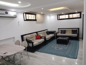 Khu vực ghế ngồi tại Appartements S1 et S2, cité El Wafa